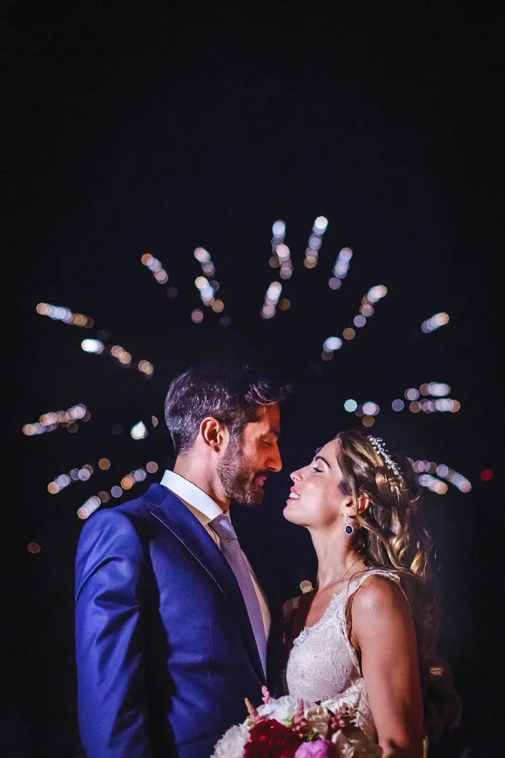 a man and woman in wedding attire